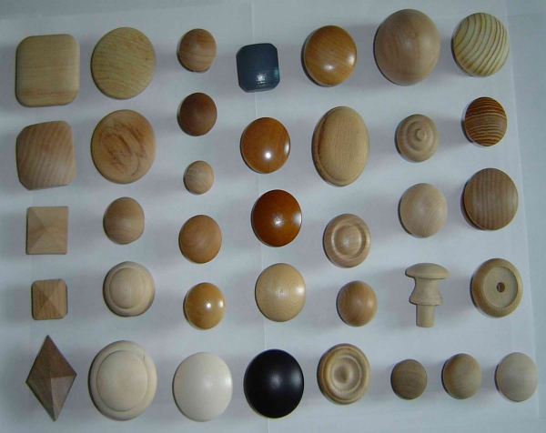 Custom wood turnings made into a variety of wooden knobs finished, painted and unfinished.